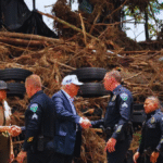 Texas rescue workers search through debris and flood-damaged areas in Kerr County after deadly Hill Country flooding in July 2025.